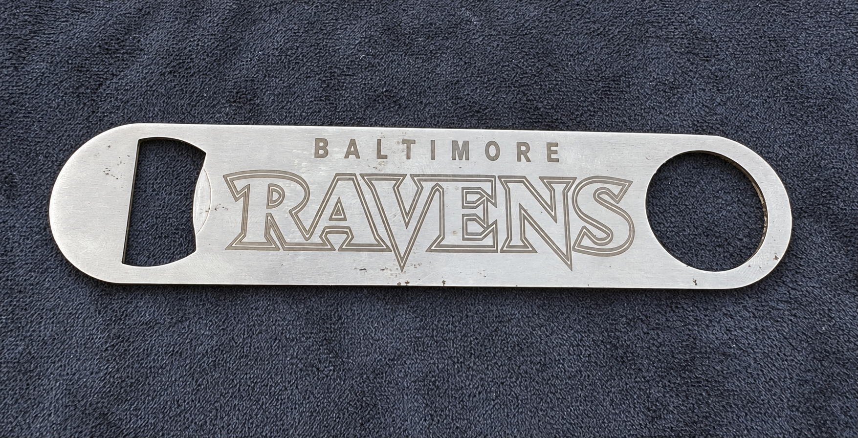 Baltimore Ravens engraving on a metal bottle opener